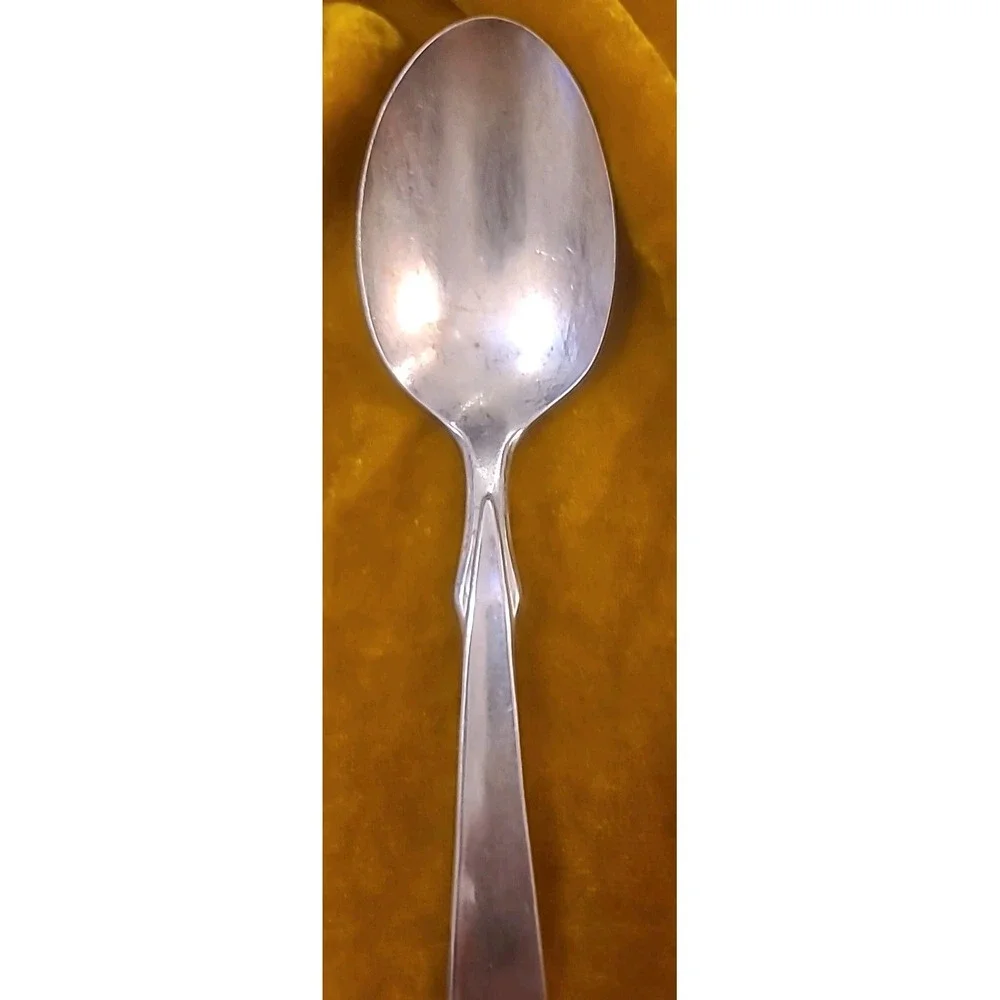 This item‎ is a vintage silver-plated souvenir International Hotel Spoon